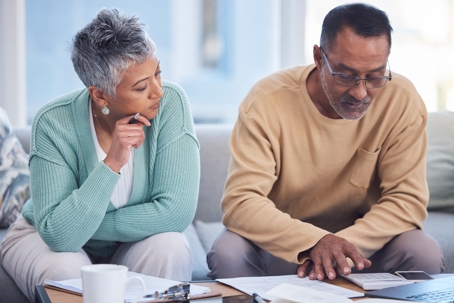 married couple reviewing documents