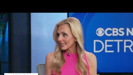 A smiling blonde woman in a pink top sits on a news set with "CBS NEWS DETROIT" in the background. Text includes: LOTTERY, DAILY 4 EVENING, 2510, DRAW DATE: TUESDAY, SEP 14.