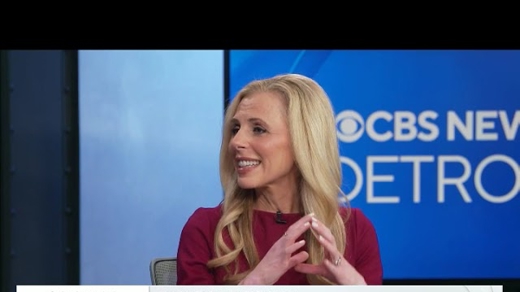 A blonde legal expert, Danielle Mayoras, speaks on CBS News Detroit. She wears a maroon top, gesturing with her hands. Text: DANIELLE MAYORAS LEGAL EXPERT/ATTORNEY.